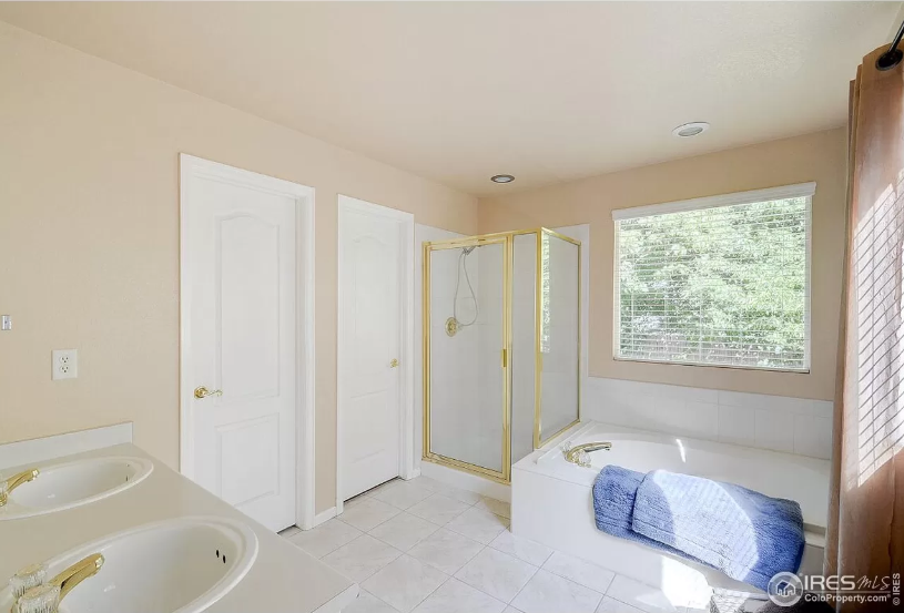 Vanilla builder grade bathroom before picture