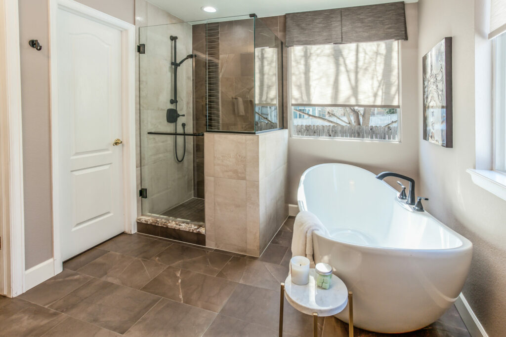 Updated primary bath remodel utilizing contrasting finishes